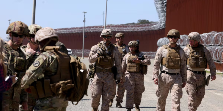 La militarización de Trump de la frontera deja a cientos de inmigrantes enfrentando delitos federales por invasión