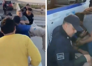 Captan momento exacto en el que policías evitan que un hombre salte de un puente